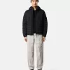 Veste à capuche avec tunnels sans coutures pour les plumes et système anti-chute Veste à capuche avec tunnels sans coutures pour les plumes et système anti-chute