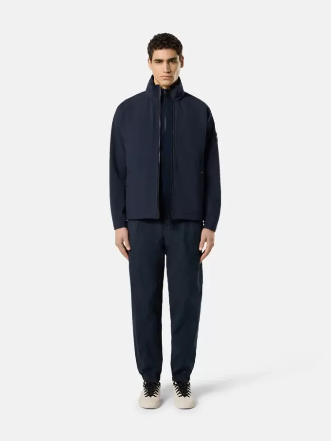 Veste coupe-vent et imperméable avec capuche dissimulée Veste coupe-vent et imperméable avec capuche dissimulée