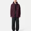 Veste de terrain à capuche avec poches anti-chute et à boutons-pression. Veste de terrain à capuche avec poches anti-chute et à boutons-pression.