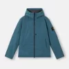 Veste matelassée à capuche avec poches anti-chute et à boutons-pression. Veste matelassée à capuche avec poches anti-chute et à boutons-pression.